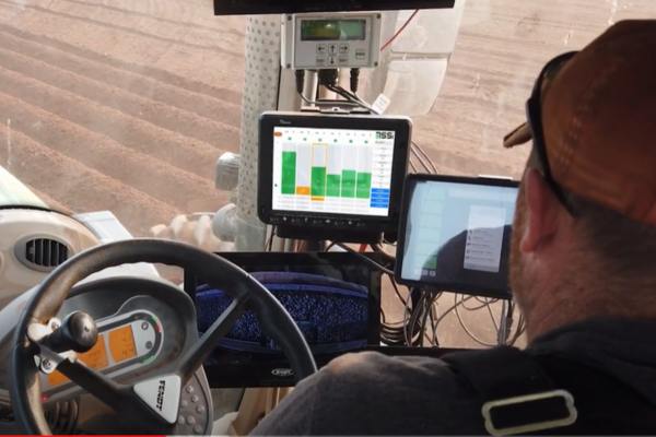 Image of SST monitor active in cab of tractor.